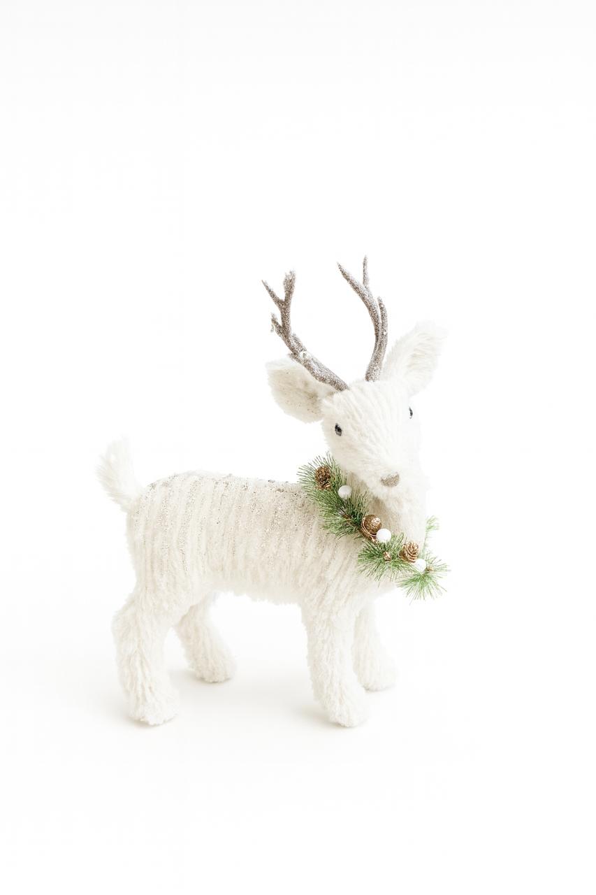 White Reindeer with Pine Garland