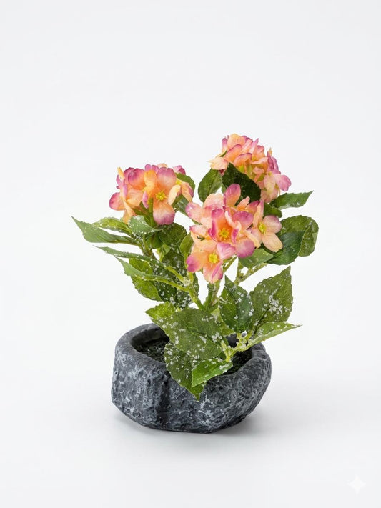 Artificial Pink Floral Plant in Stone-Style Pot