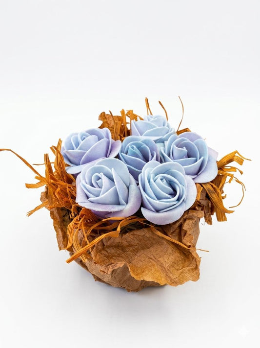 Artificial Blue Rose Arrangement in Decorative Base